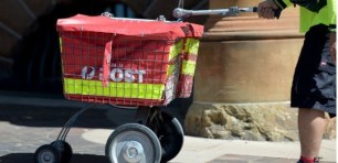 Australia Post to cut 2000 jobs as it pushes for move to slower mail service