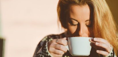 woman drinking coffee