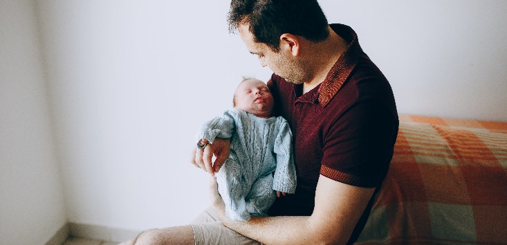 father with baby parental leave